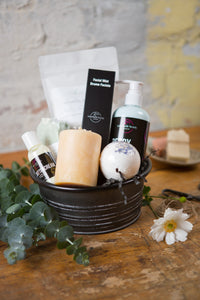 This soothing basket includes local lotions, bath salts, soap, a facial mist and beeswax candle. 