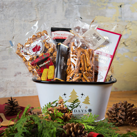 Wish your friends and family a Happy Holiday with this Festive Gift Basket. Local kettle chips, maple popcorn, local chocolate pretzels and pizza, a coffee truffle bar, plus cookies.