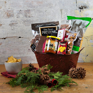 This basket has local tortilla chips, salsa and pita crackers, local chocolate pretzels, fudge, chocolate bark, and maple popcorn, plus shortbread.