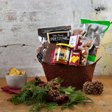 This basket has local tortilla chips, salsa and pita crackers, local chocolate pretzels, fudge, chocolate bark, and maple popcorn, plus shortbread.
