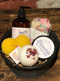 Locally made bar soap, bathbomb and body butter with a hand poured beeswax candle. 