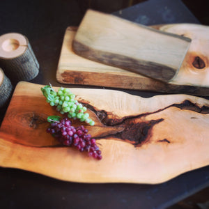 Rustic Charcuterie boards made from logs recovered from the bottom of Ontario lakes. 