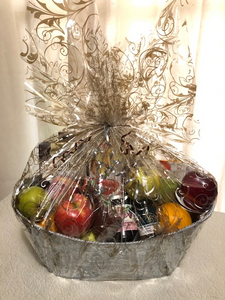 Gourmet Fruit Basket has a selection of fruit mixed with local crackers, jam, cookies, tea and more.